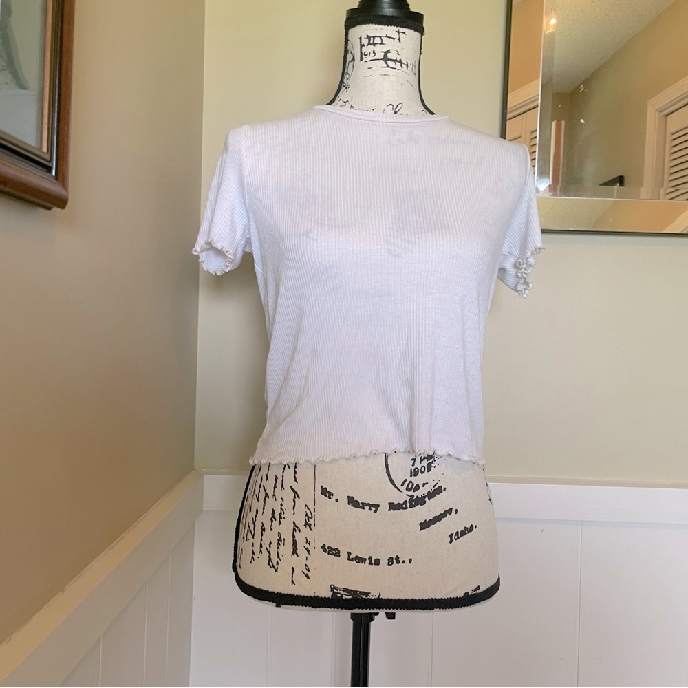 American Eagle- White ribbed shirt, with lettuce trim, size medium.